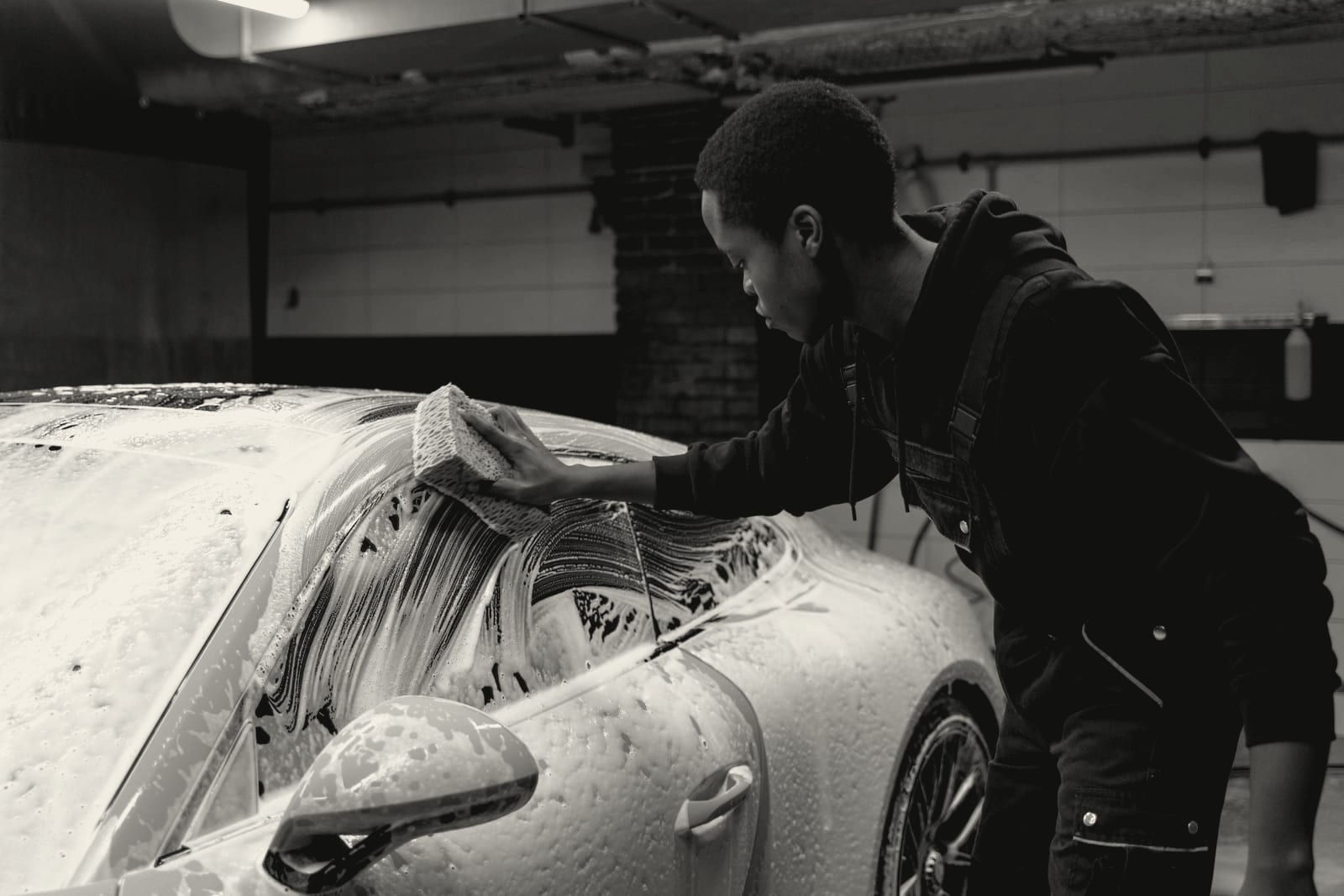 Foam covering a vehicle during a hand wash